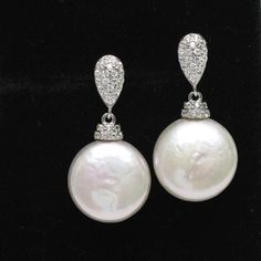 Item No: ER347 Item: freshwater coin pearl earrings Pearl size:12-13mm Pearl skin: clean Pearl color:ivory /white color Pearl luster: good Pearl quality: AA Metal: sterling silver posts Stone: CZ rhinestone Packing: beautiful gift box,ready for gift giving Please contact Lisha freely if you have any specific demand or need custom order, I will always try my best to meet your request. Coin Pearl Earrings, Coin Pearls, Pearl Earrings Dangle, Wedding Jewelry Earrings, Large Earrings, Pearl Color, Pearl Size, Bridesmaid Earrings, Cz Stone