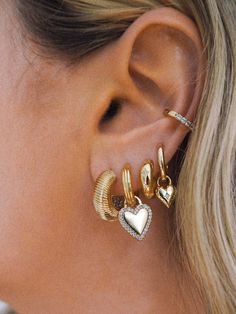 Experience the most luxurious hoops. Our durable sterling silver base is topped with a thick coat of 14k gold plating that can be worn 24/7. Pick your fav size. PS these make such a great gift. 14k gold plated sterling silver XS hoops measure approx 9.5mm S hoops measure approx 13.5mm M hoops measure approx 18mm Coated for long-wearing protection Does fit our charms if you want to add one! Chunky Earrings, Waterproof Jewelry, 14k Gold Necklace, Jewelry Lookbook, Iconic Style, Gold Collection, Sterling Silver Hoops, Silver Hoops, Sterling Silver Charm