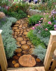 an image of a garden with rocks and flowers on it, in the middle of a page