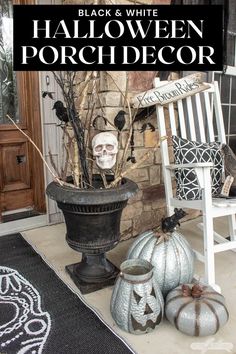 a porch decorated for halloween with pumpkins and decorations