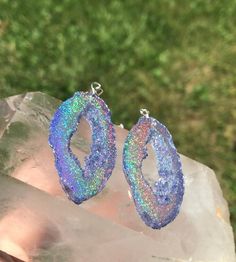 These purple holographic color shifting geode earrings are sure to get compliments or make an amazing one of a kind gift! They are mostly a clear purple at a certain angle and then as soon as they shift they show a beautiful sparkly rainbow. They are lightweight and won't bother your ears. For those who want all the sparkle but in a smaller geode stud, these are also available! https://www.etsy.com/listing/1180059919/holographic-gem-studs Matching necklaces available, link below https://www.etsy Affordable Hypoallergenic Iridescent Earrings, Cheap Iridescent Earrings For Party, Cheap Multicolor Crystal Earrings For Gift, Holographic Color, Purple Holographic, Boho Chic Earrings, Geode Earrings, Long Tassel Earrings, Diy Resin Crafts