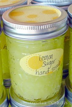 several jars filled with lemon sugar sit next to each other