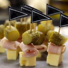 small appetizers with meat and vegetables on sticks