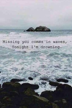 an ocean with rocks and the words missing you comes in waves, tonight i'm drawing