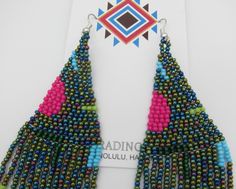 Amazing Modern Powwow Native American Style Boho Seed Bead Earrings with a variety of native colors in a modern non-traditional design. Stainless steel ear wires and genuine high quality beads. A beautiful combination of colors and native design at a super price. At nearly 6 inches in total length these are just amazing. Great to wear alone or to match with your dancing regalia. Cool modern look with a traditional flair. All handmade. Shipped Free to your home or office from Hawaii. Aloha! Multicolor Southwestern Style Dangling Beads, Southwestern Multicolor Dangling Beads, Southwestern Style Multicolor Dangling Beads, Southwestern Green Beaded Dangle Earrings, Southwestern Green Earrings With Colorful Beads, Southwestern Style Green Earrings With Colorful Beads, Southwestern Green Beaded Dangling Earrings, Southwestern Green Earrings With Dangling Beads, Powwow Regalia