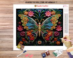 a cross stitch pattern with the words zoom to see the sparkle on it, and an image of a butterfly