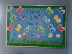 a bulletin board that says spring is in the air