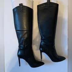 Black. Leather. Point Toe Boot. Knee Height. Slightly Worn. Good Condition. Side Zipper. Sleek Formal Heeled Boots In Faux Leather, Black Snip Toe Heeled Boots For Formal Occasions, Classic Black Knee-high Boots For Formal Occasions, Classic Faux Leather Heeled Boots For Evening, Classic Evening Heeled Boots In Faux Leather, Elegant Black Snip Toe Boots, Fitted Leather Boots For Night Out, Black Snip Toe Knee-high Boots For Work, Sleek Black Heeled Boots With Leather Lining