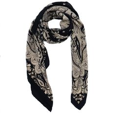 The Kala Paisley Scarf is a beautiful staple will elevate your collection. The simplicity of a modern beige and black color scheme accentuates the traditional classic Indian paisley design, allowing the skill behind the design and hand silk screen printed technique to really come through. This 100% crepe silk fabric is soft and ethereal, draping gracefully however it is worn. Pair with a bold color for a statement or with muted colors for an understated yet chic look. Your Parekh Bugbee purchase Formal Paisley Print Silk Scarf, Formal Silk Scarf With Paisley Print, Traditional Black Silk Scarves, Elegant Pashmina Scarves With Paisley Print, Elegant Pashmina Scarf With Paisley Print, Elegant Silk Scarves With Paisley Print, Elegant Pashmina Silk Scarf With Paisley Print, Elegant Silk Scarf With Paisley Print, Traditional Black Silk Scarf