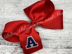 "Faux chenille initial embroidered hair bow made with grosgrain ribbon with glitter htv behind letter. Single initial faux chenille font embroidered on tail of bow.  Large and medium bows are mounted to a french style clip barrette, and small bows are on an alligator clip with teeth.  If you wish to have a headband or other style of clip, just put in note to seller.    Made to order in a smoke-free environment.  Approximate bow measurements:  Large 6\", Medium 5\", Small 4\"." Faux Chenille, Bow Measurements, Embroidered Hair Bows, Making Hair Bows, Small Bows, Monogrammed Items, Ribbon Colors, How To Make Bows, S Pic