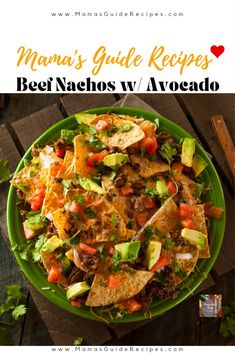 a green plate filled with nachos and salsa on top of a wooden table