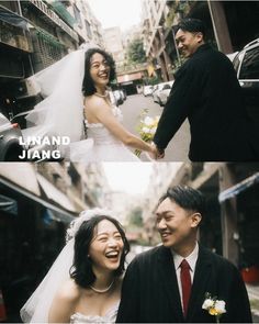 two people are holding hands and smiling at each other in front of a building on the street