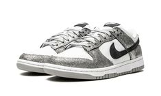 The Women’s Nike Dunk Low “Golden Gals” is a women’s-exclusive version of the retro basketball shoe in a colorway with Metallic Silver leather overlays.  A December 2021 release, the “Golden Gals” channels a decidedly luxurious vibe with its shiny, cracked leather overlays in Metallic Silver.  The panels are contrasted by a white knitted, micro-mesh base and black suede Swoosh.  Black “Nike” branding is embroidered on the heel and white “Nike” and Swoosh detailing arrives on the black nylon tong Nike Dunk Low Golden Gals, Sneakers Box, Kobe Shoes, Retro Basketball Shoes, Sneaker Stores, Nike Brand, Sneaker Release, Nike Dunk Low, Air Max 1