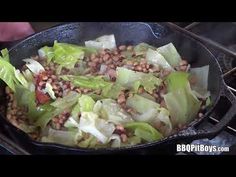 lettuce and beans cooking in a skillet on the stove