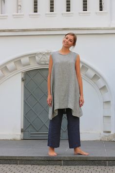 "Handcrafted Oeko-Tex Standard certified 100% European linen smock dress ideal for everyday wear. Perfect for springtime or chilly summer days. Always dress to kill! Neckline: round Sleeves: no Pockets: no Details: *Colour shown: small grey stripes *Model is wearing size M *Medium weight *Maternity-friendly *Relaxed fit *Not-ironed (and no need to) *Handmade by @LinenCloud Easy care: - Machine wash gentle - Wash seperately or with similar colours - Tumble dry on low heat - Non-iron. Simply wash Summer Linen Tunic For Daywear, Casual Spring Linen Everyday Dress, Casual Linen Dress For Everyday Spring Wear, Summer Daywear Linen Tunic, Fall Lagenlook Linen Tunic, Linen Tunic For Loungewear, Spring Linen Tunic For Loungewear, Summer Linen Tunic For Loungewear, Casual Flax Linen Dress For Daywear