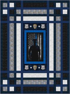 a blue and black quilt with an image of a man standing in front of a flag