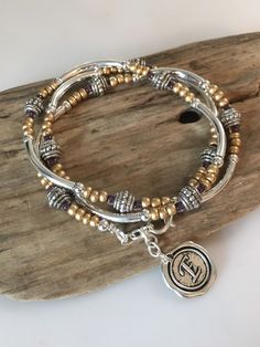 Beaded Boho Silver Tube Wrap Bracelet/ Necklace/Frosted gold Brown, 3X Multi Wrap Bracelet, Tibetan Style by BohoBlissCreations on Etsy https://www.etsy.com/listing/232718814/beaded-boho-silver-tube-wrap-bracelet Multi Wrap Bracelet, Wooden Farmhouse, Beaded Memory Wire Bracelets, Beaded Memory Wire, Wire Bracelets, Bracelets Design, Beading Ideas, Memory Wire Bracelets, Textile Jewelry