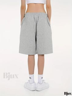 Bjux - High-Quality Drawstring Mid-Length Pants with Solid Design, Slant Pockets, and Comfortable Fit - Ideal for Casual and Sports Fashion - Womens Apparel Baggy Sporty Shorts, Baggy Sports Bottoms For Spring, Baggy Bottoms For Sports In Spring, Comfortable Gray Sports Bottoms, Sports Pants With Built-in Shorts For Spring, Baggy Sportswear Bottoms For Leisure, Comfortable Gray Leisure Bottoms, Comfortable Gray Bottoms For Leisure, Basic Sports Bottoms For Spring