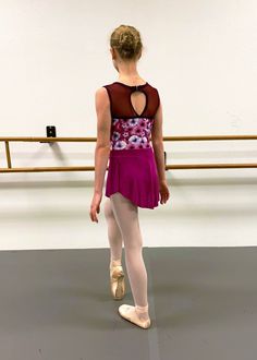 The Glissade leotard is perfect for class, rehearsal, or performance. The fun print will make dancers stand out in a crowd. The classy pink flowers are fun, but tasteful. The front is lined with spandex so that your leotard is completely opaque. Options are available for white mesh our maroon mesh Fitted Dancewear Leotard For Dance Class, Pink Stretch Leotard For Spring, Fitted Leotard For Dance Class, Summer Stretch Pink Leotard, Summer Ballet Stretch Leotard, Pink Stretch Leotard For Dance, Pink Ballet Leotard, Pink Fitted Dance Leotard, Summer Sleeveless Ballet Leotard