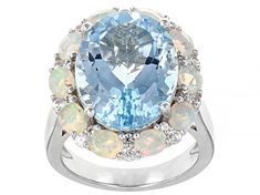 9.78ct Oval Glacier Topaz With 1.00ctw Oval Ethiopian Opal And 0.51ctw Round White Zircon Rhodium Over Sterling Silver Ring. Measures Approximately 0.72"L X 0.85"W. Not Szieable. Gia Certified Oval Blue Topaz Ring, Gia Certified Oval Silver Topaz Ring, Sky Blue Topaz, Broken Chain, Topaz Gemstone, Ethiopian Opal, Gemstone Colors, Blue Topaz, Post Earrings