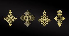 four gold cross pendants on a black background