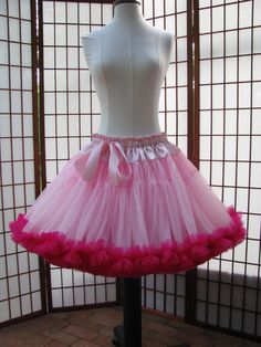 "This listing is for a custom version of the pictured super-full double layer nylon chiffon pettiskirt with satin waist. The pictured pettiskirt was designed for a 33.5\" (85cm) waist and is 19\" (48,5cm) long. It is displayed on a dress form with a 22\" (56cm) waist. You can choose any length up to 25\" (63,5cm) long. I will lengthen the tiers to achieve a longer length. The \"look\" of the pettiskirt becomes more A-line as I make it longer. If you would prefer this style in other colors or a s Fitted Pink Petticoat With Ruffled Skirt, Pink Tiered Petticoat With Attached Cancan, Pink Tulle Petticoat For Costume Party, Fitted Pink Petticoat For Party, Party Petticoat With Attached Cancan In Pink, Pink Fitted Petticoat For Party, Fitted Pink Skirt For Costume Party, Pink Fitted Skirt For Costume Party, Fitted Pink Petticoat For Dance