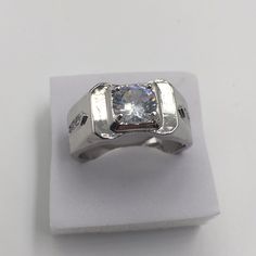 This Ring Is High-Quality, So You Can Buy With Confident Yes It Sparkles, 2 Carat Cubic Zirconia It Has Three Small Cz‘s On The Side, 925(Sterling Silver Plated) I Will Ship The Same Day. Size 11. R10. Women’s Ring Sterling Silver Channel Set Rings, Formal Silver Rings With Channel Set, Formal Silver Ring Channel Set, Formal Silver Channel Set Rings, Classic White Topaz Jewelry In White, Formal Channel Set Silver Rings, Classic White Topaz Jewelry, Sterling Silver Rings With Channel Set In White, White Sterling Silver Channel Set Rings