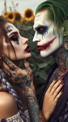 two women with tattoos and makeup are standing next to each other in front of sunflowers