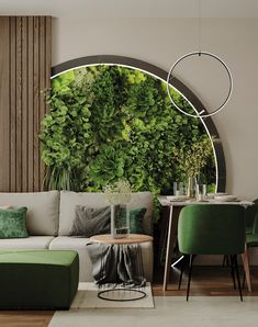 the living room is decorated in green and neutral colors, with modern touches to it