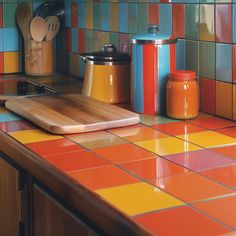 colorful kitchen counter with cutting board and utensils