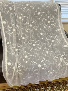 This is a semi-sheer, embroidered, soft chiffon, white fabric with white embroidered floral pattern dispersed throughout the body. MATERIAL =100% soft cotton chiffon ...this is a sheer, lightweight material ideal for summers. USAGE = Wear it as a stole, wrap, shawl, bridal veil, use it to create a bed canopy, small chuppah cover, table lamp cover, or use it to stitch a beautiful dress or blouse. SIZE = 41'' x 90 inch CARE = gentle hand wash in cold water with mild detergent, hang dry in shade or Traditional Sheer Georgette Dupatta, White Dupatta With Lace Work For Summer, Bridal Wrap, Bed Canopy, White On White, Wrap Shawl, Lamp Cover, Shawl Wrap, Bridal Veil