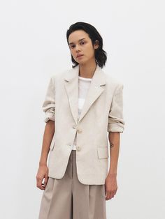 This is a minimal and feminine blazer by MOHAN that is made out of high quality and sturdy fabric. With design detail that gives a trendy and refined mood, you can style it with various items for a clean daily outfit. - Cool and light touch of linen and cotton blend fabric- Half length lining with vapor permeability- Padding on the shoulder Feminine Blazer, Herringbone Blazer, Light Touch, W Concept, Daily Outfits, 2 Colours, Herringbone, Design Details, Cotton Blend