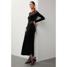 Black mesh and velvet (90% Polyester, 10% Spandex). Sheath. Long sleeves. Crewneck. Pull on. 54" from shoulder to hemline. Imported. Chic Stretch Mesh Dress For Evening, Fall Bodycon Mesh Dress With Mesh Sleeves, Stretch Bodycon Dress With Sheer Sleeves For Evening, Sheer Sleeves Mesh Dress For Night Out In Fall, Elegant Velvet Dress For Fall Night Out, Fall Mesh Dress With Sheer Sleeves For Night Out, Elegant Fall Velvet Evening Dress, Sheer Stretch Bodycon Dress For Evening, Evening Bodycon Dress With Sheer Back