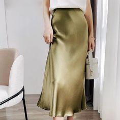 This satin midi skirt is a must-have. Designed with timeless style in mind, the high waist A-line silhouette gives a flattering finish. The hidden zip closure means you can get in and out of the skirt very easily. For a casual look, style with a t-shirt and trainers and to dress it up add a pair with heels. High waisted A-Line Silhouette Hidden zip closure Midi Length Unlined 100% Polyester Summer Korean Fashion, Silk Skirts, A Line Midi Skirt, Hacks Clothes, Heels High, Purple Skirt, Satin Midi Skirt, Satin Blouses, Fashion Hacks