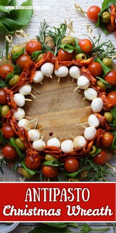 a christmas wreath made out of tomatoes and other vegetables with the words antpasto christmas wreath