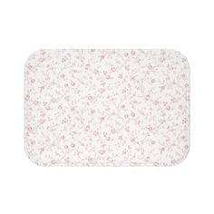 a white and pink flowered placemat