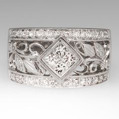 a white gold ring with diamonds on it