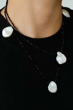 Captivating Baroque Pearl Petals meets sparkling Obsidian in this exquisite necklace. With rare and high-quality pearls, it effortlessly adds a refined yet relaxed vibe to any outfit. Elevate your style today. Gemstone: Black Spinel/Natural Baroque Pearl Necklace Length: 95cm Weight: 41.5g Obsidian Meaning, Black Spinel Necklace, Spinel Necklace, Baroque Pearl Necklace, Gemstone Beaded Necklace, Necklace Sets, Black Spinel, Swarovski Pearls, Short Necklace