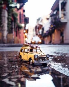 a toy car that is sitting in the street