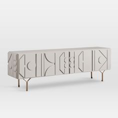 the sideboard is designed to look like it has been painted in white and silver