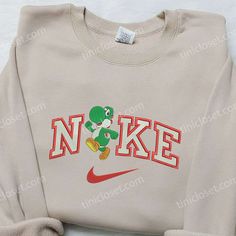 Yoshi x Nike Embroidered Shirt, Mario Embroidered Shirt, Custom Nike Embroidered Shirt Casual Long Sleeve Shirt With Embroidered Logo, Casual Long Sleeve Shirt With Custom Embroidery, Grinch Christmas Sweater, Grinch Stuff, Cute Christmas Outfits, Custom Nike, Red Suit, Nike Sweater, Cute Sweatshirts