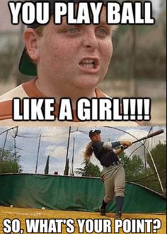 a man holding a baseball bat on top of a batting cage with the caption you play ball like a girl so, what's your point?