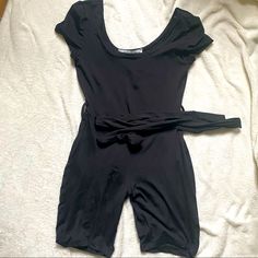 Super Cute, Fitted Black Romper. Never Worn, Only Tried On. Belt Loops And Belt Included. Material Is A Bit See Through So Does Require Nude Undergarments Black Stretch Jumpsuits And Rompers For Summer, Casual Bodycon Jumpsuits And Rompers For Summer, Black Summer Bodysuit For Workwear, Black Bodysuit For Summer Workwear, Casual Stretch Jumpsuits And Rompers For Going Out, Black Bodysuit For Workwear In Summer, Black Summer Bodysuit For Work, Casual Fitted Jumpsuits And Rompers For Night Out, Fitted Casual Jumpsuits And Rompers For Night Out