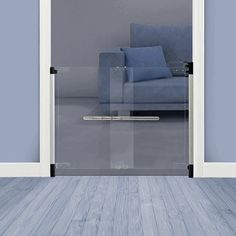 an open door leading to a blue couch