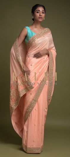 Buy Online from the link below. We ship worldwide (Free Shipping over US$100)  Click Anywhere to Tag  Salmon Peach Saree In Cotton Silk With Zardozi And Sequins Embroidered Floral Border And Buttis Online - Kalki Fashion  Salmon peach saree in cotton silk adorned with zardozi and sequins embroidered floral border.Further enhanced with embroidered floral buttis. Reception Saree, Saree Cotton, Jacquard Saree, Peach Saree, Organza Silk Saree, Indian Designer Sarees, Moroccan Fashion, Zari Work, Georgette Fabric