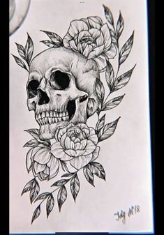 a drawing of a skull with roses on it