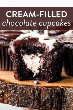 chocolate cupcakes with cream - filled chocolate frosting on top