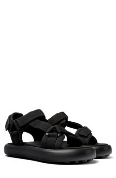 Triple adjustable straps perfect the fit of this sporty sandal set on a cushioned XL EXTRALIGHT® sole for flexible, shock-absorbing comfort. Adjustable hook-and-loop straps Cushioned footbed Recycled-polyester upper and lining/synthetic sole Imported