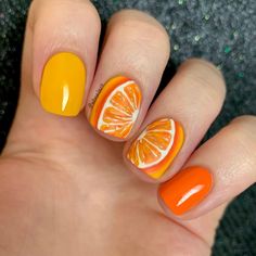 Nothing like citrus screams summer, with its vibrant and tangy flavor. The inspiration for this manicure is the fruit itself; against a bright yellow backdrop, refreshing juicy slices of orange make quite a statement.   Photo credit by: @nbnailart Orange Citrus Nails, Orange Slice Nails, Short Neon Nails, Citrus Nails, Orange Nail Design, Yellow Backdrop, Fruit Nail Art