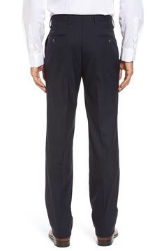 Stretch-infused tropical wool defines handsome trousers crafted in a crisp, versatile flat-front cut. 16 1/2" leg opening; 9 1/4" front rise; 14 3/4" back rise Zip fly with button-tab closure Slant pockets; back button-closure welt pockets Unhemmed. These trousers can be hemmed for free at your local Nordstrom. Find a store Lined to the knee 98% wool, 2% spandex Dry clean Imported Men's Clothing Semi-formal Wool Dress Pants With Flat Front, Semi-formal Wool Dress Pants Flat Front, Semi-formal Wool Flat Front Dress Pants, Wool Dress Pants With Welt Pockets, Ankle-length, Cheap Full-length Men's Dress Pants, Wool Trousers, Straight Cut, Welt Pockets, Welt Pocket